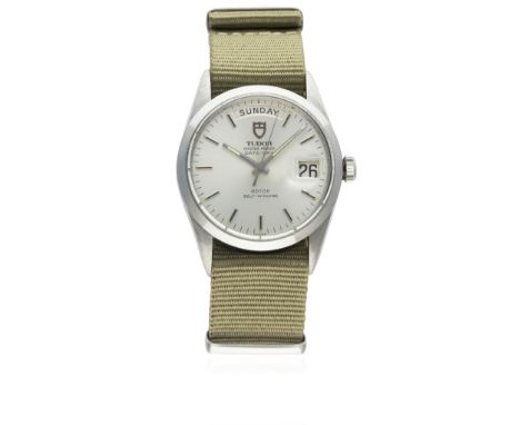 A GENTLEMAN'S STAINLESS STEEL ROLEX TUDOR DATE DAY SELF WINDING WRIST WATCH CIRCA 1983, REF. 94500 
D: Silver dial with black