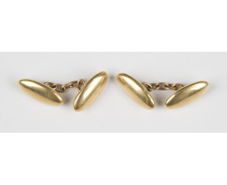A pair of gold cufflinks with hollow oval backs and fronts, detailed '18ct', weight 6.9g, with a case.Buyer’s Premium 29.4% (
