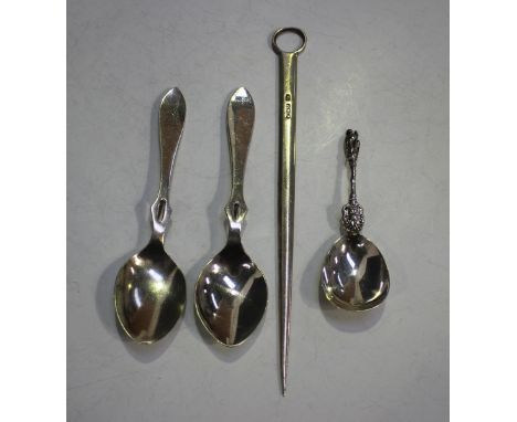 A Victorian silver apostle caddy spoon, London 1874, indistinct maker's mark, length 10cm, a silver letter opener in the form