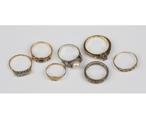 A Victorian gold and mauve gem set five stone mount, a gold, platinum and diamond three stone ring, detailed '18ct Plat', a c