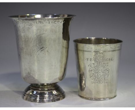 An 18th century French silver beaker of flared form, on a domed foot, height 8.7cm, together with a smaller silver beaker of 