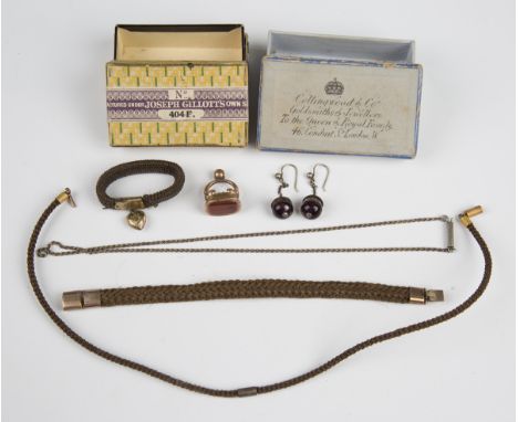 A group of Victorian hair work jewellery, comprising a woven bracelet, length 16.5cm, a woven necklace, length 33cm, and a sc
