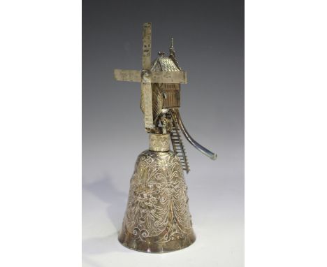 A 19th century Dutch silver windmill wagner cup, the bell shaped bowl decorated in relief with fruit and leaves, the stem for