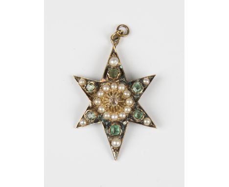 A Victorian diamond, emerald and half-pearl set pendant, designed as a six pointed starburst, mounted with the cushion cut di