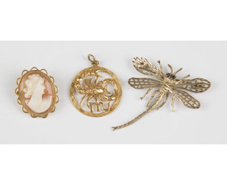 A 9ct gold Scorpio pendant, weight 3.2g, length 3cm, a 9ct gold brooch, designed as a dragonfly with gem set eyes, weight 4g,