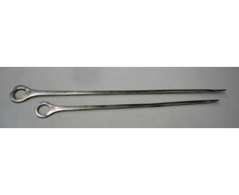 A pair of George III silver graduated meat skewers, possibly provincial, each with plain ring terminal, stamped single conjoi