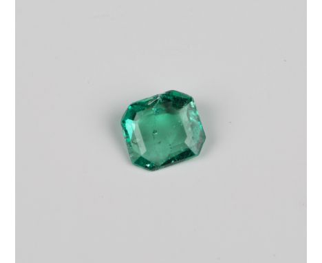 An unmounted cut cornered rectangular cut emerald, with the original purchase receipt and gem certificate card.Buyer’s Premiu