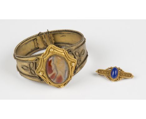 A gold and lapis lazuli brooch in the classical taste, with bead and ropetwist wirework decoration, detailed '18K', weight 3.