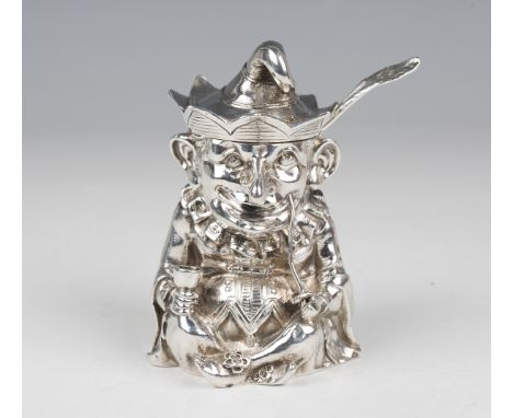 A rare Victorian silver novelty Mr Punch mustard pot, finely modelled sitting cross-legged with pipe and goblet, his crown sh