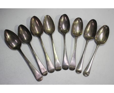 A group of eight mid-18th century and later Old English pattern and Hanoverian pattern tablespoons, various dates and makers,