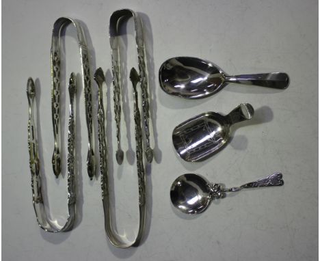 A pair of George III silver sugar tongs with pierced handles and scallop shell terminals, London 1791 by Peter &amp; Ann Bate