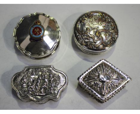 A late Victorian silver lozenge shaped box with hinged lid, decorated in relief with scrolls within pinched rims, Birmingham 