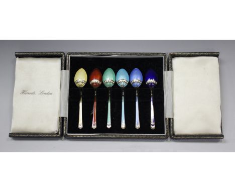 A set of six Elizabeth II silver and enamelled coffee spoons, each bowl back and handle decorated in a different enamel colou