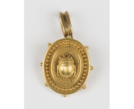 A Victorian gold oval pendant brooch with a central scarab motif within a beaded and wirework applied surround, the back glaz