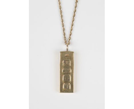 A 9ct gold rectangular ingot shaped pendant, weight 14.5g, length 3.8cm, with a gold neckchain, detailed '9ct', on a gold bol