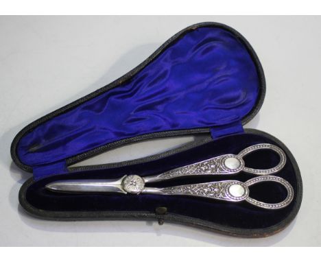 A pair of late Victorian Venetian pattern silver grape shears, London 1896 by William Hutton &amp; Sons Ltd, weight 135.5g, l