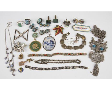 A group of costume jewellery, including bracelets, brooches and earrings, together with a group of wristwatches.Buyer’s Premi