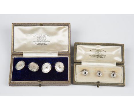 A pair of two colour gold and mother-of-pearl cufflinks, each circular back and front with a mother-of-pearl centre within a 