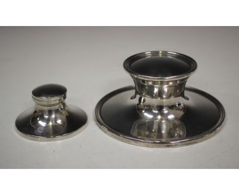 A George VI silver capstan inkwell, Birmingham 1938 by Turner &amp; Simpson, diameter 13.9cm, and a smaller silver capstan in