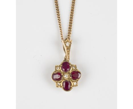 A gold, ruby and diamond cluster pendant, mounted with four oval cut rubies and five circular cut diamonds, weight 1.2g, leng