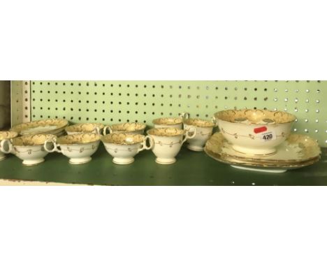 SHELF OF GOLD &amp; WHITE CHINAWARE