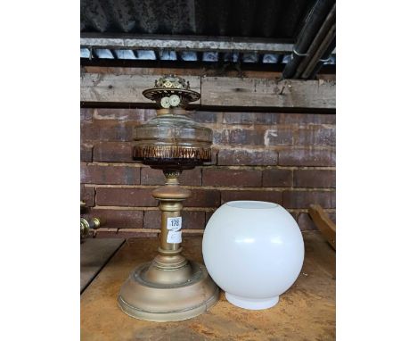 BRASS OIL LAMP WITH A CLEAR GLASS RESERVOIR &amp; A WHITE SHADE