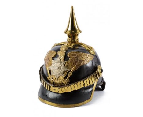 dating: about 1870 provenance: Prussia, Leather skull, angled visor, with brass mounts, front decoration with the star of the