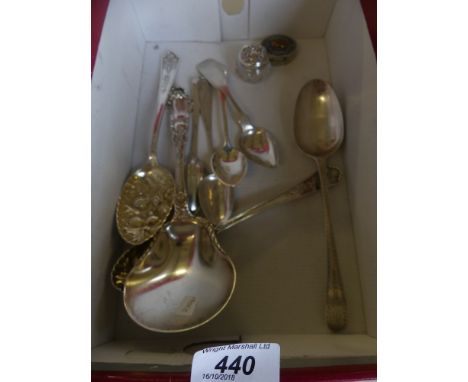 A selection of white metal flatware to include a selection of spoons, together with a trinket box and lidded jar 