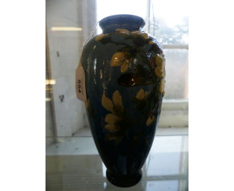 A 19th Century Leeds ceramic vaseDecorated in relief with floral sprays on a twin tone blue ground, impressed factory marks a