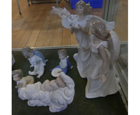 A collection of Nao figures of young children together with a Leonardo model of angels (5) 