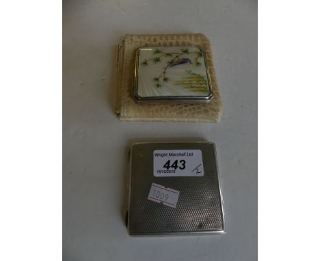Two silver compactsEach of square outline, one with enamel bird decoration, each with engine-turned decoration, opening to re