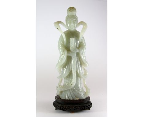 A superb 19th/ early 20th Century Chinese carved speckled jade figure of a Tang lady with original finely carved wooden base,