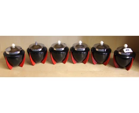 Six Art Deco A. J. Wilkinson Ltd ceramic jam pots with chrome and Bakelite lids designed by Clarice Cliff, H. 12cm.