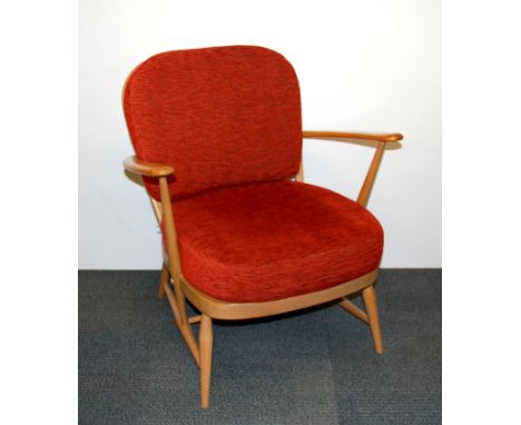 An Ercol armchair.