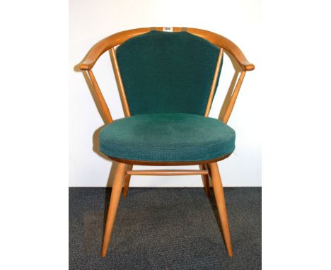 An Ercol armchair.