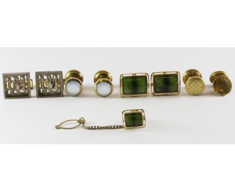 Four pairs of cufflinks and a jade set tie pin.