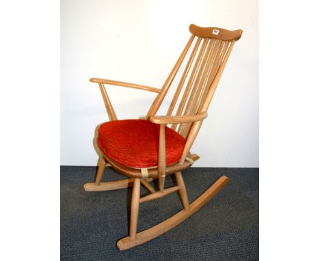 An Ercol rocking chair, H. 85cm.