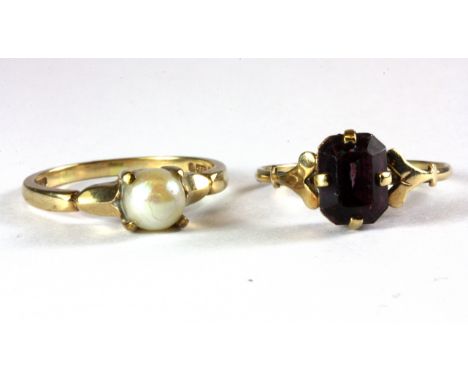 A 9ct yellow gold pearl set ring and a 9ct gold amethyst set ring, (L.5 & M).