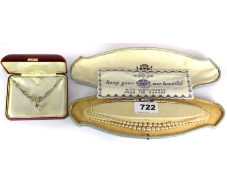 A cased vintage Lotus faux pearl necklace with a silver and marcasite clasp, together with a further marcasite necklace.