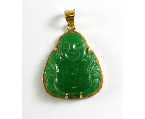 A Chinese 18ct yellow gold (stamped 18ct) and carved jade Buddha pendant, L. 3cm.