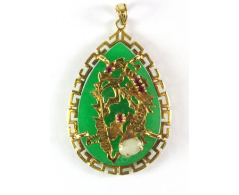 A Chinese 14ct yellow gold (stamped 585) pendant set with jade, rubies and opal, L. 4cm.