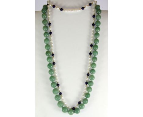 A vintage jade necklace with a Chinese silver gilt clasp and a cultured pearl and Lapis Lazuli necklace.