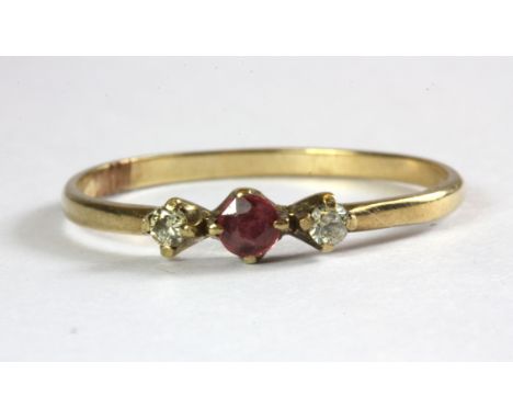 A 9ct yellow gold ruby and diamond set ring, (Q.5).