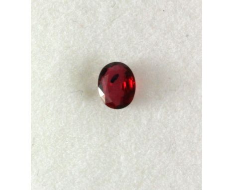 A natural untreated oval cut ruby, approx. 0.45ct, 5 x 4mm.