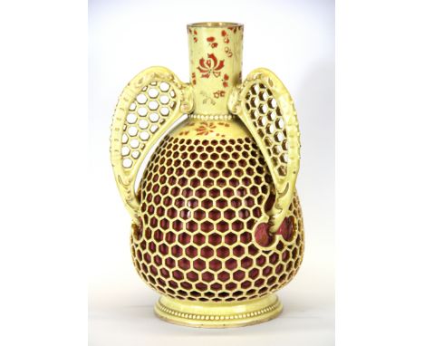 A Hungarian Zsolnay honeycomb design vase, H. 25cm.