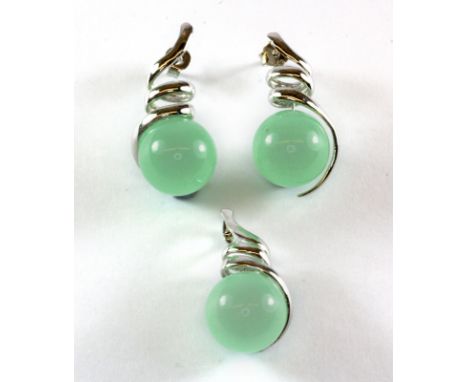A 925 silver jade set pendant and matching pair of earrings.