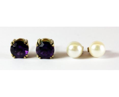 A pair of 9ct yellow gold pearl set earrings, together with a pair of yellow metal amethyst set earrings (missing butterflies