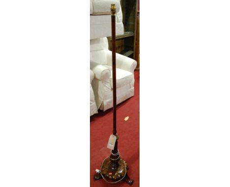An early Victorian rosewood standard lamp (converted from a pole screen)