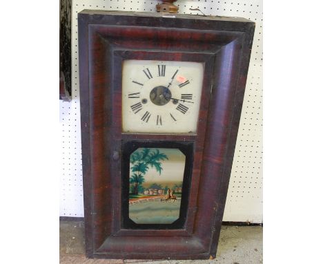 An early 20th century American mahogany cased drop trunk wall clock 