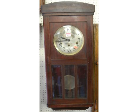 A 1930s beech drop trunk wall clock 